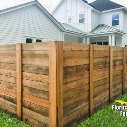 horizontal wood fence around a florida home