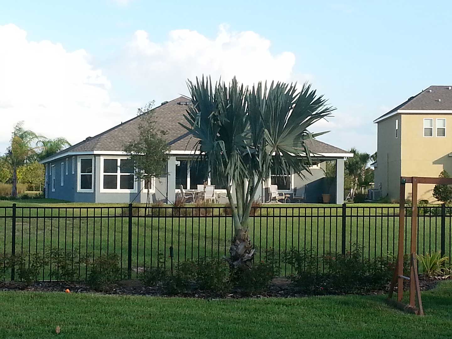 aluminum fence surrounding a florida home