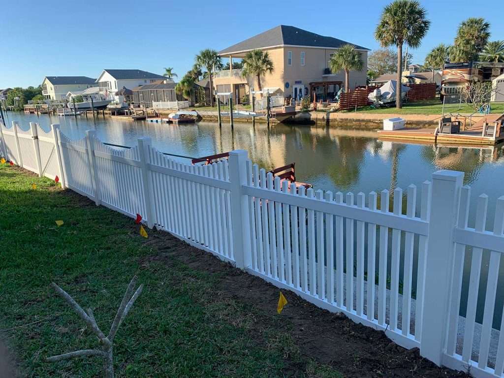 white vinyl picket fence