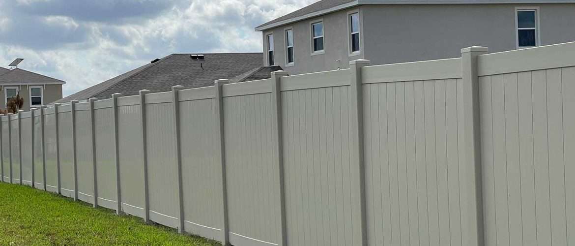 a tan vinyl fence around Tampa homes