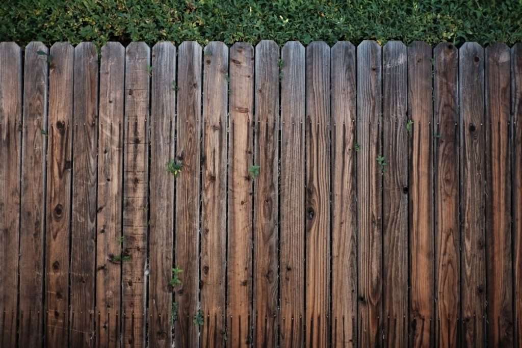 a worn wooden fence